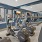 exercise equipment inside of a gym with windows