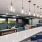 a room with a bar and chairs