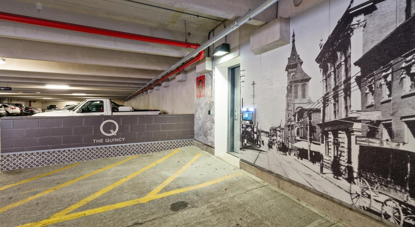 Find your perfect fit at The Quincy a street with graffiti on the walls