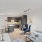 a living room with a couch and a tv