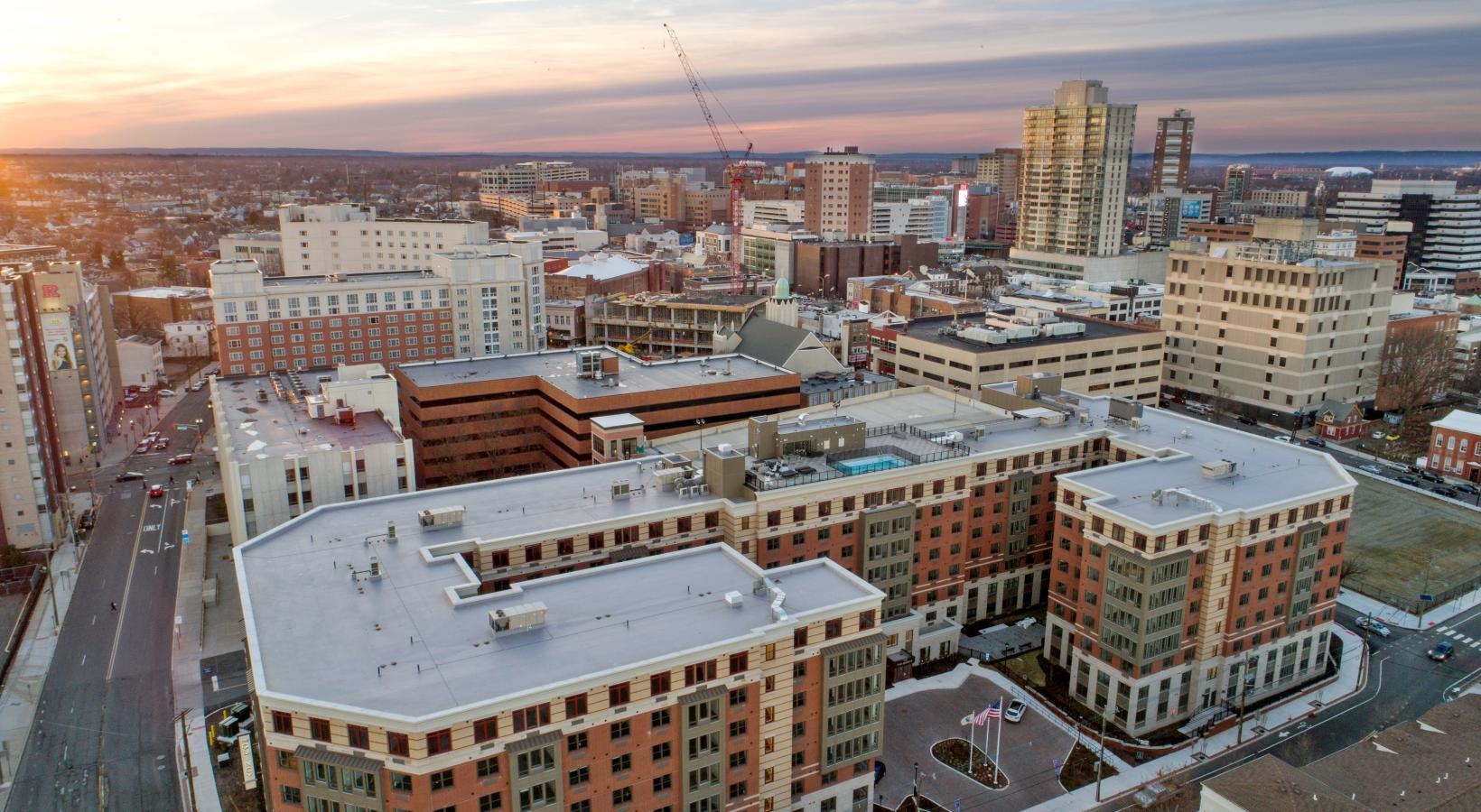 Settle into comfort at The Quincy a city with many buildings