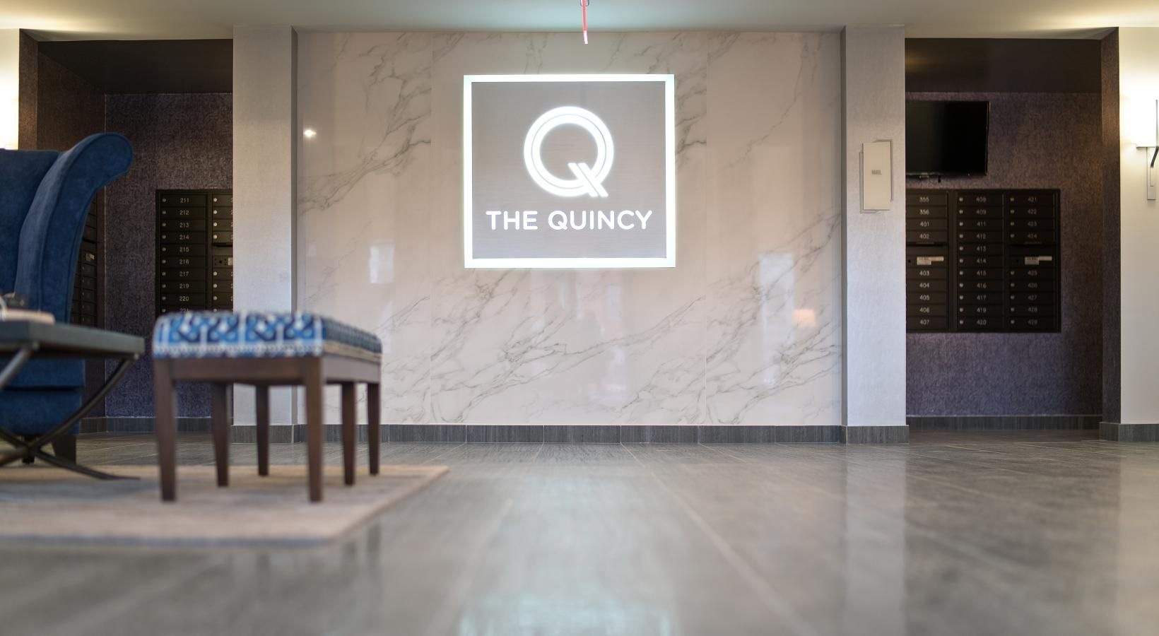 Take advantage of all The Quincy has to offer a foyer with a table and chairs