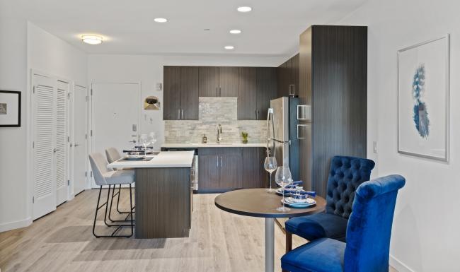 a kitchen with a dining table