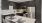 a kitchen with a table and chairs