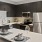a kitchen with a table and chairs