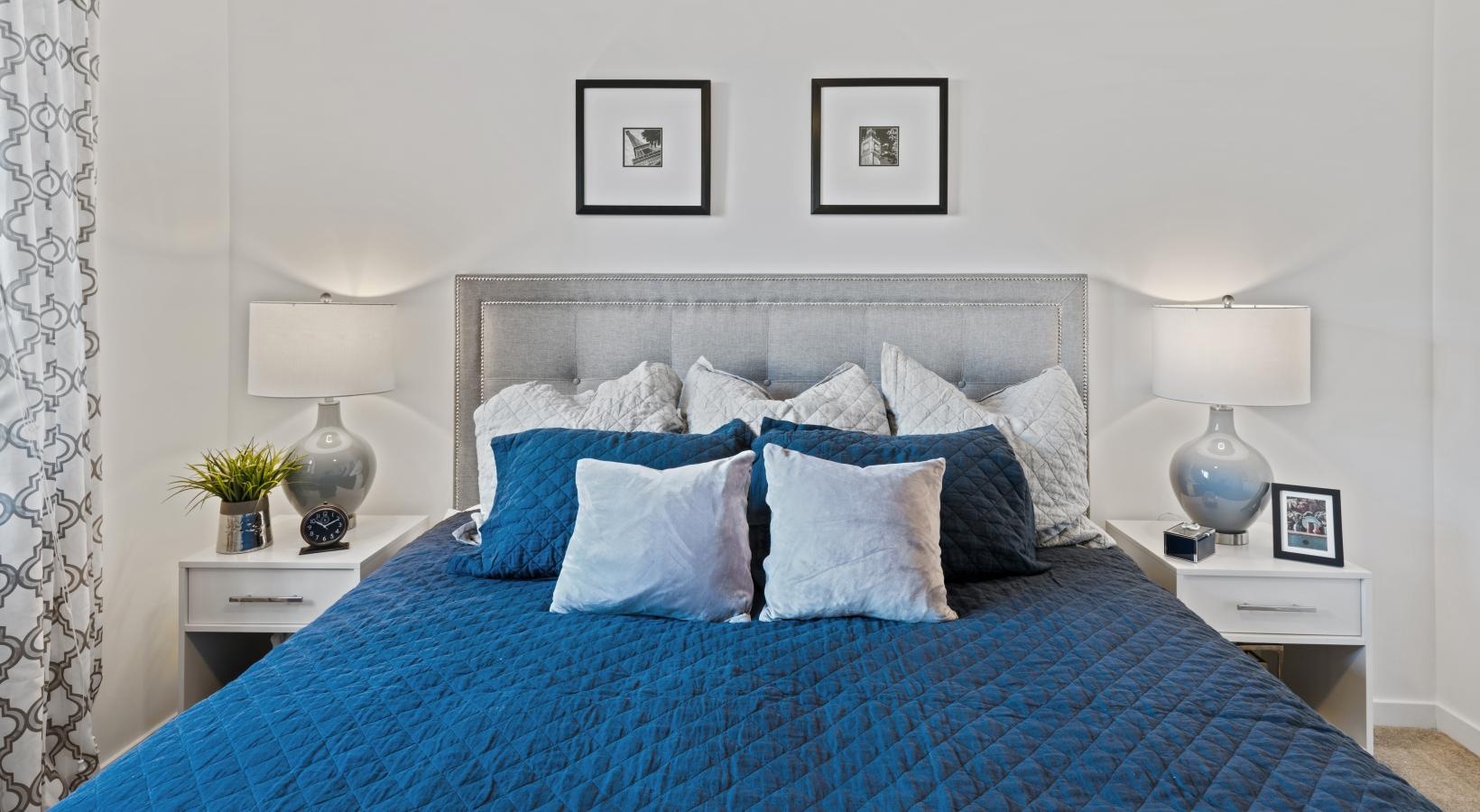 Bedroom options to fit every lifestyle a bed with blue pillows