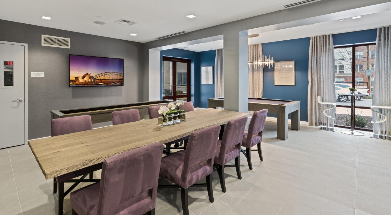 Everything within reach a community dining room with a large table