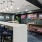 a room with a bar and chairs