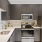 a kitchen with black cabinets